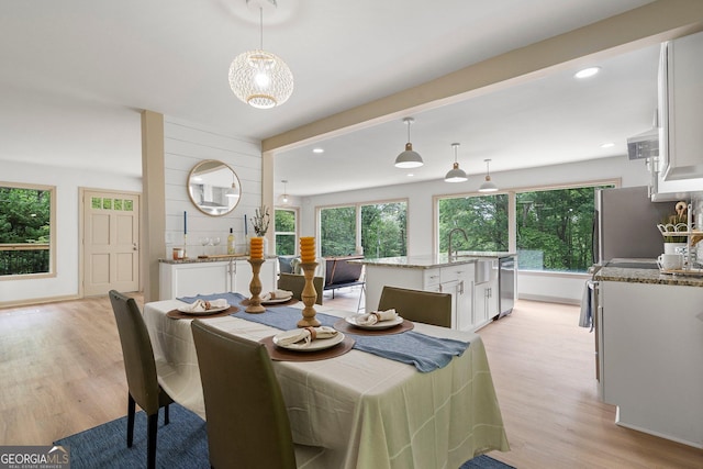 5985 Lakeside Ct, Gainesville, GA 30506 - dining space featuring light wood-style flooring, recessed lighting, and baseboards