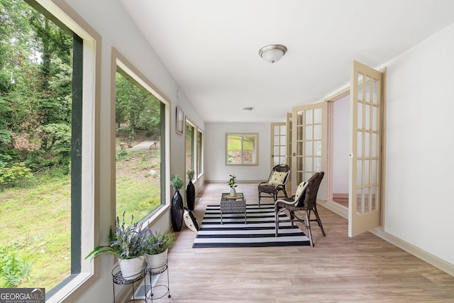 5985 Lakeside Ct, Gainesville, GA 30506 - sunroom / solarium with french doors, wood finished floors, and baseboards