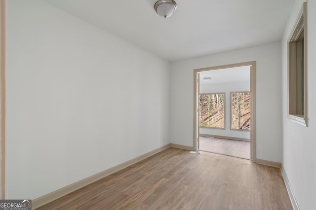 5985 Lakeside Ct, Gainesville, GA 30506 - unfurnished room with light wood finished floors and baseboards