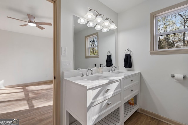 5985 Lakeside Ct, Gainesville, GA 30506 - full bathroom with wood finished floors, healthy amount of natural light, a ceiling fan, and double vanity