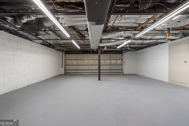 5985 Lakeside Ct, Gainesville, GA 30506 - garage featuring concrete block wall