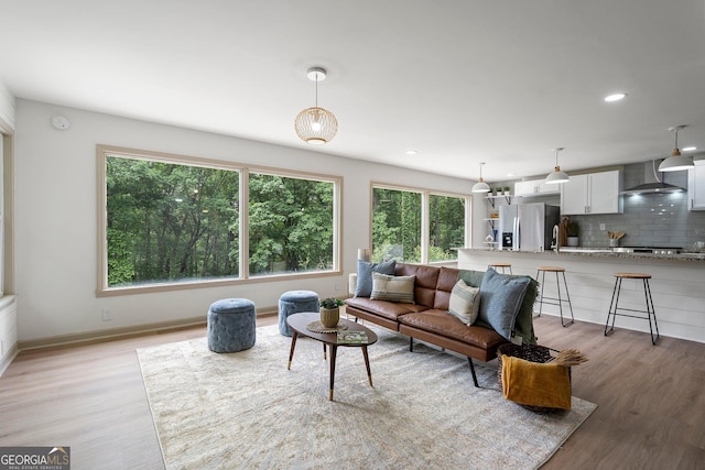 5985 Lakeside Ct, Gainesville, GA 30506 - living room featuring light wood-style floors, healthy amount of natural light, recessed lighting, and baseboards