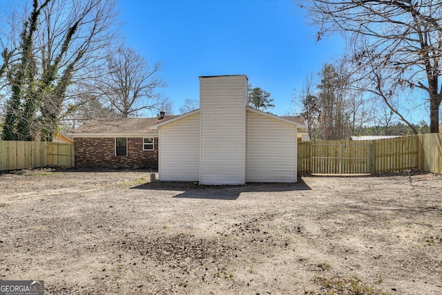 view of outdoor structure with fence