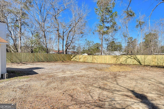 view of yard featuring fence