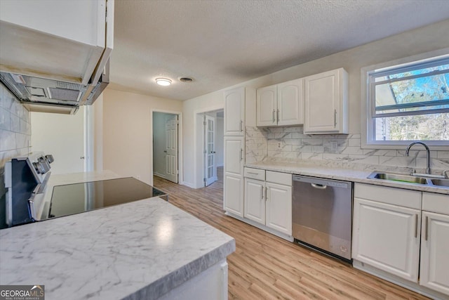 kitchen with electric stove, light wood finished floors, white cabinetry, a sink, and dishwasher