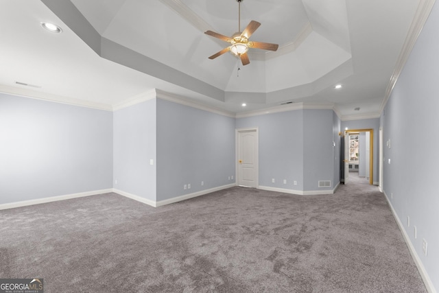 1348 Ewing Creek Dr, Dacula, GA 30019 - unfurnished room featuring a tray ceiling, carpet flooring, ceiling fan, recessed lighting, and crown molding