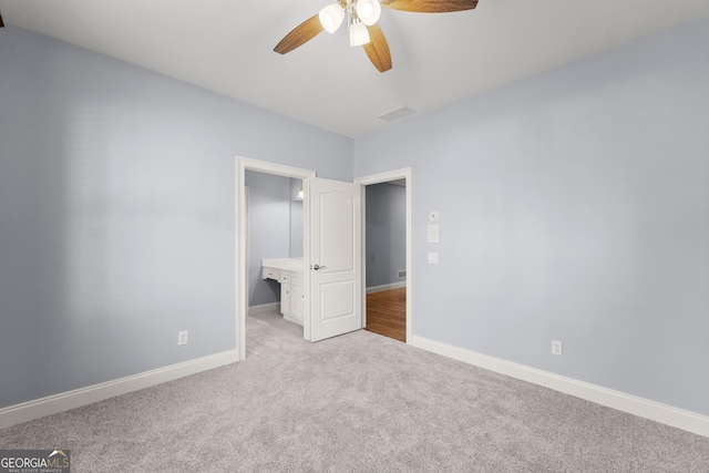 1348 Ewing Creek Dr, Dacula, GA 30019 - unfurnished bedroom featuring carpet and a ceiling fan