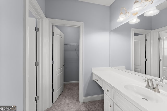 1348 Ewing Creek Dr, Dacula, GA 30019 - bathroom with vanity and baseboards