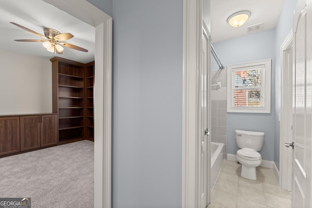 1348 Ewing Creek Dr, Dacula, GA 30019 - bathroom with bathing tub / shower combination, a ceiling fan, and tile patterned floors