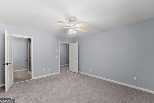 1348 Ewing Creek Dr, Dacula, GA 30019 - unfurnished bedroom featuring carpet flooring and ceiling fan