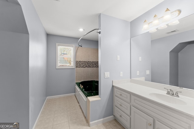 1348 Ewing Creek Dr, Dacula, GA 30019 - bathroom with vanity, washtub / shower combination, tile patterned flooring, and recessed lighting