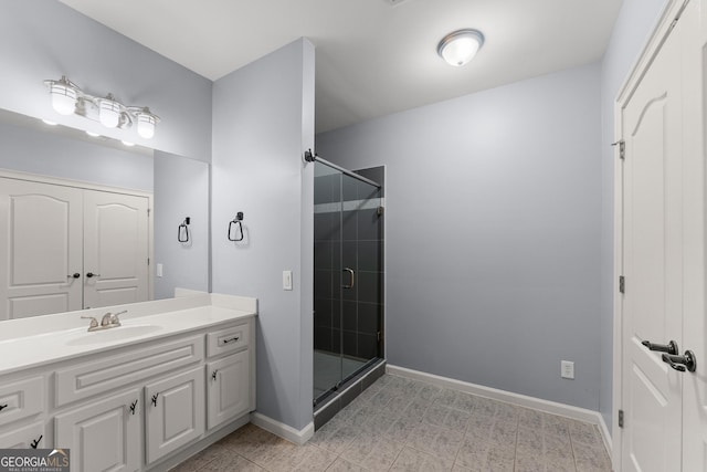 1348 Ewing Creek Dr, Dacula, GA 30019 - full bathroom with vanity, a shower stall, and tile patterned floors