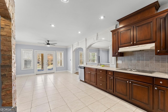 1348 Ewing Creek Dr, Dacula, GA 30019 - kitchen with ornamental molding, arched walkways, dishwasher, under cabinet range hood, and a ceiling fan