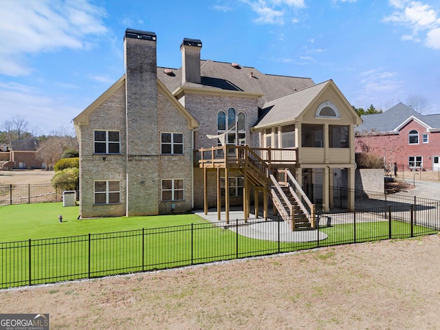 1348 Ewing Creek Dr, Dacula, GA 30019 - rear view of property featuring a sunroom, a patio area, stairs, a chimney, and a fenced backyard