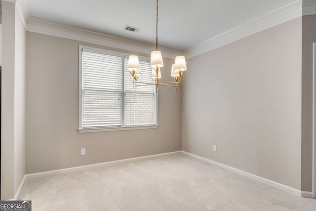 unfurnished room with baseboards, visible vents, ornamental molding, an inviting chandelier, and carpet flooring