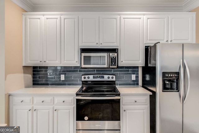 kitchen with stainless steel appliances, white cabinetry, and decorative backsplash