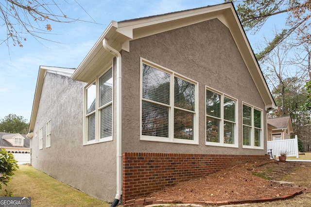 view of property exterior with stucco siding