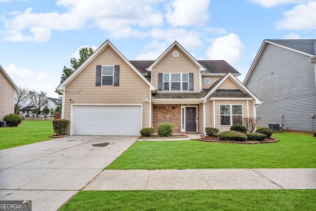 view of front facade featuring an attached garage, cooling unit, a front lawn, and concrete driveway