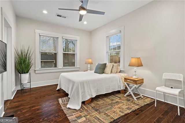 bedroom with recessed lighting, visible vents, ceiling fan, wood finished floors, and baseboards