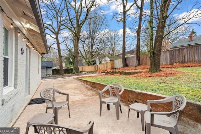 view of patio with a fenced backyard