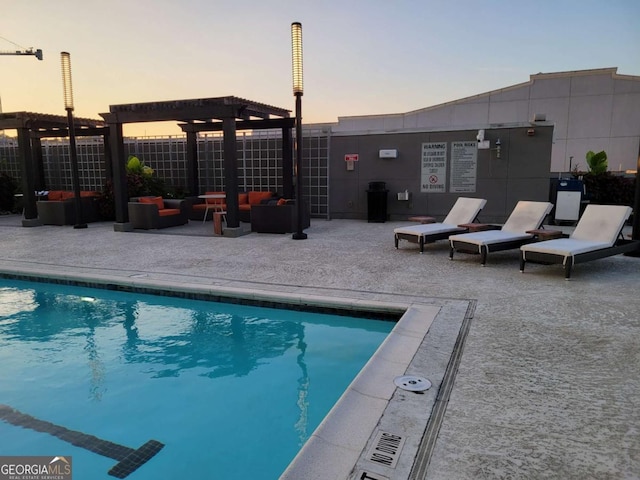 view of pool featuring a patio, fence, an outdoor hangout area, and a pergola