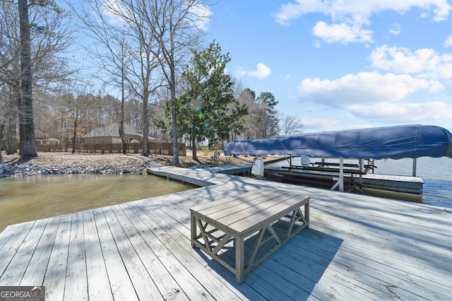 view of dock featuring boat lift