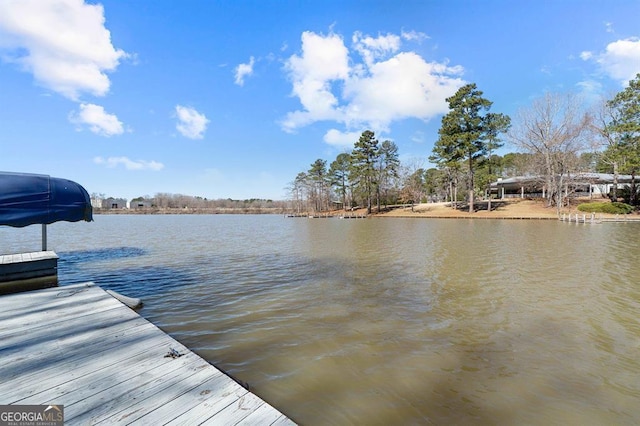 view of dock with a water view