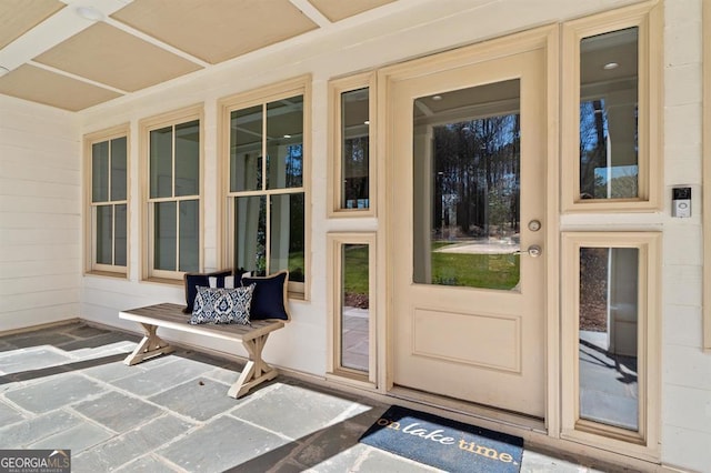 doorway to property featuring a porch