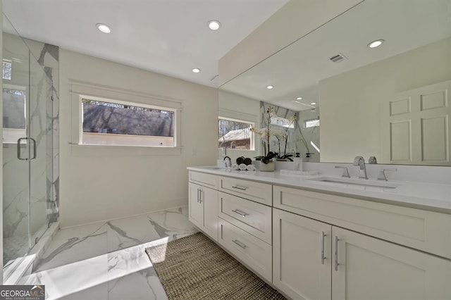 full bathroom with a marble finish shower, visible vents, marble finish floor, a sink, and recessed lighting