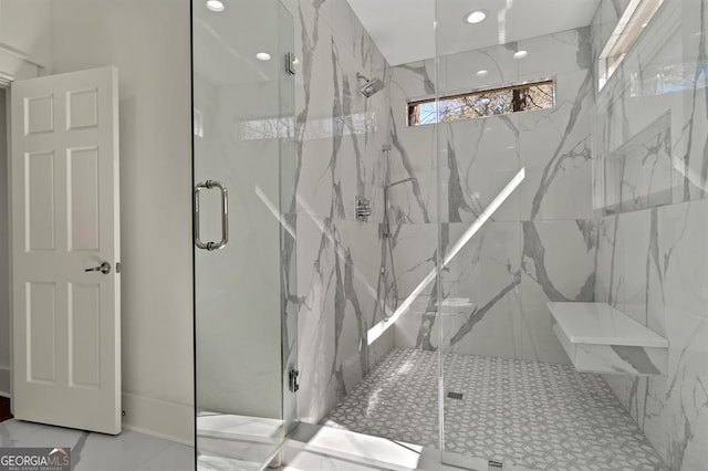 full bath with marble finish floor, a marble finish shower, and recessed lighting