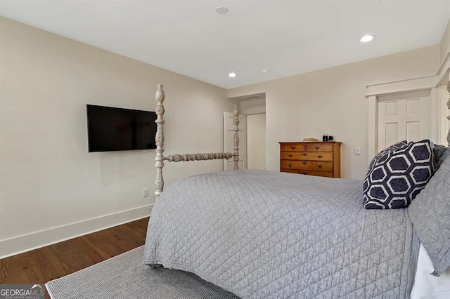 bedroom featuring recessed lighting, baseboards, and wood finished floors