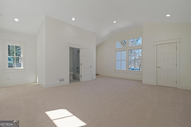 unfurnished bedroom with light carpet, lofted ceiling, visible vents, and recessed lighting