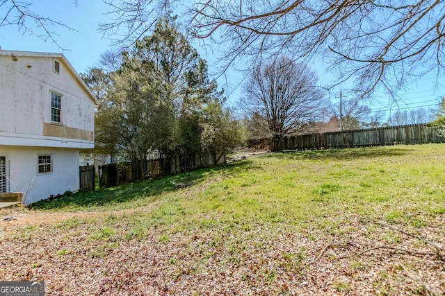 view of yard featuring a fenced backyard