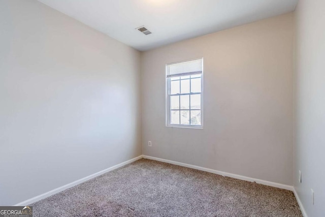 4821 Mainstreet Valley Trce, Stone Mountain, GA 30088 - carpeted empty room featuring baseboards