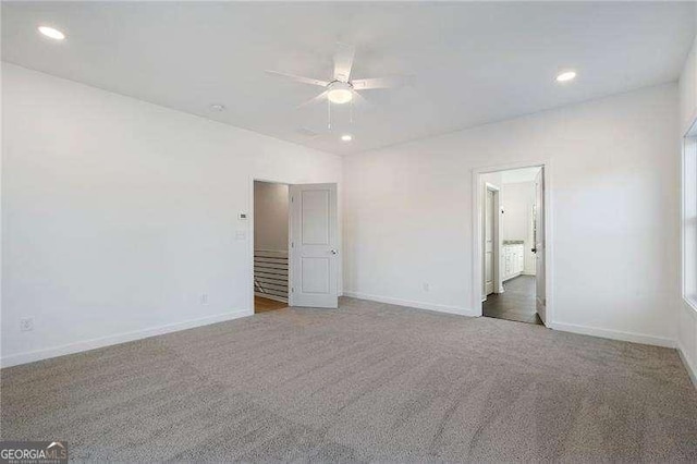 unfurnished bedroom with ceiling fan, baseboards, carpet flooring, and recessed lighting