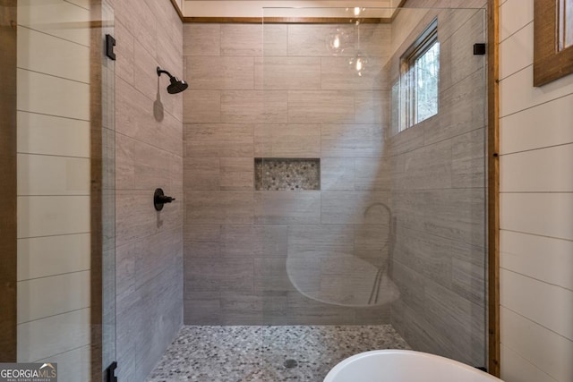 full bath with a shower stall