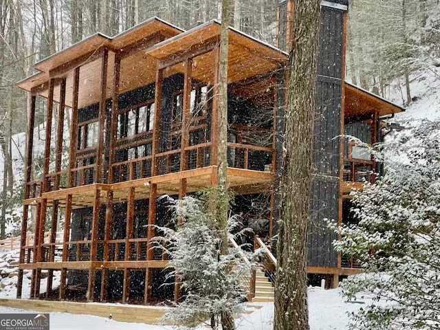 view of snow covered property