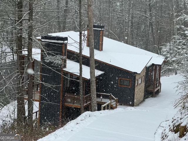 view of snow covered property