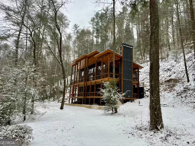 view of snow covered property