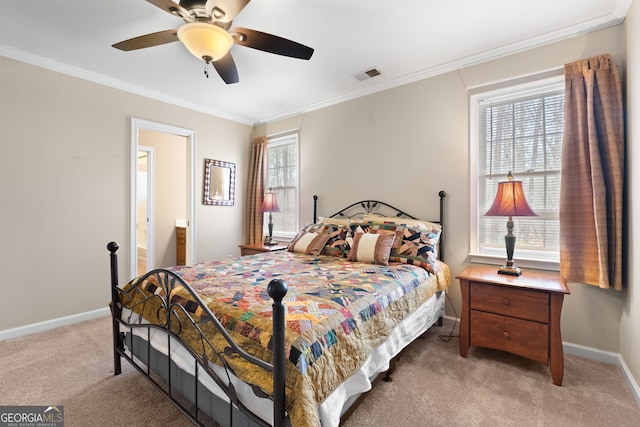 bedroom featuring light carpet, visible vents, and crown molding