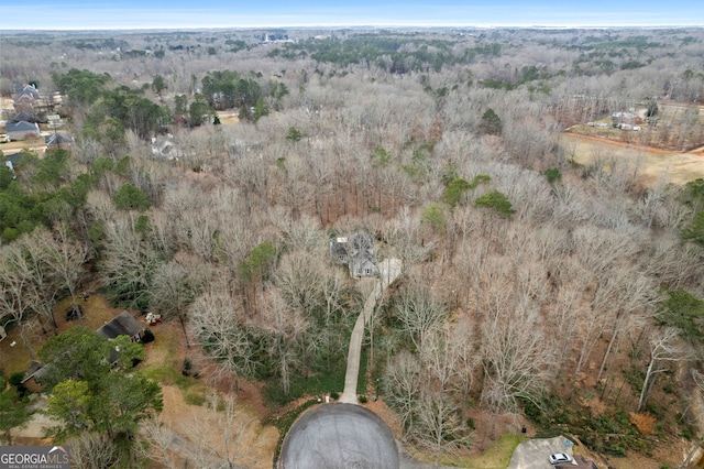 aerial view featuring a view of trees