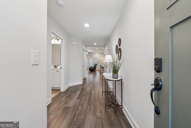 entrance foyer with recessed lighting, ceiling fan, baseboards, and wood finished floors