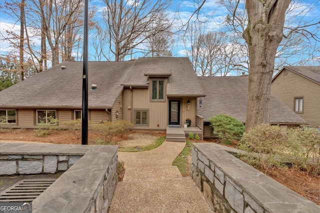 view of front of house featuring a shingled roof