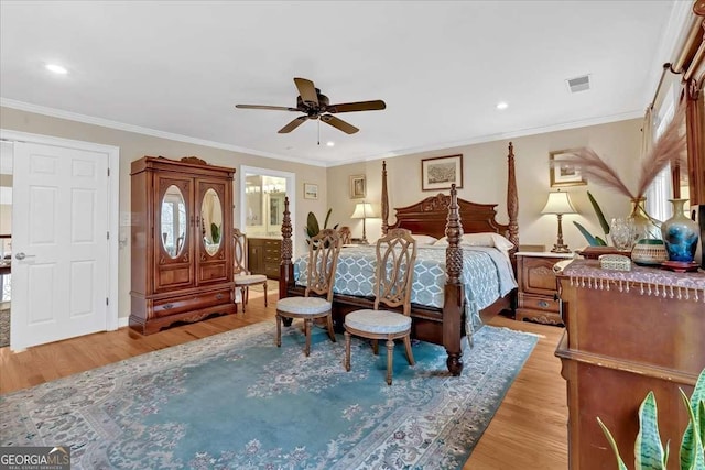 bedroom featuring recessed lighting, visible vents, ensuite bathroom, light wood-style floors, and ornamental molding