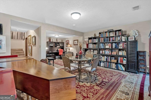 interior space with a textured ceiling