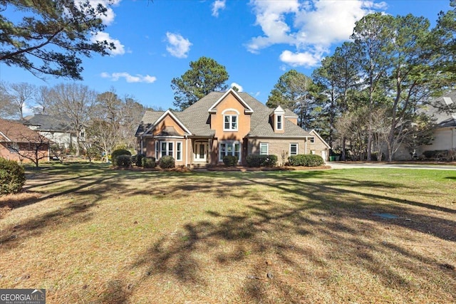 view of front of home with a front yard