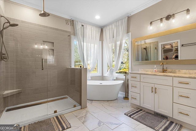 full bathroom with a freestanding tub, recessed lighting, vanity, marble finish floor, and a shower stall