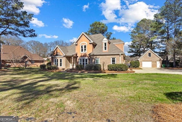 view of front of home featuring a garage, a shingled roof, and a front yard