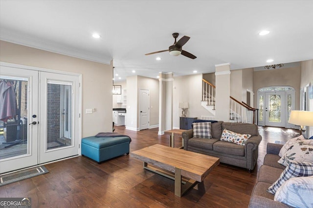 living room featuring hardwood / wood-style flooring, ornamental molding, stairs, french doors, and recessed lighting