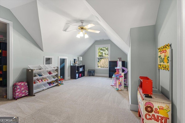 rec room with carpet floors, lofted ceiling, and ceiling fan